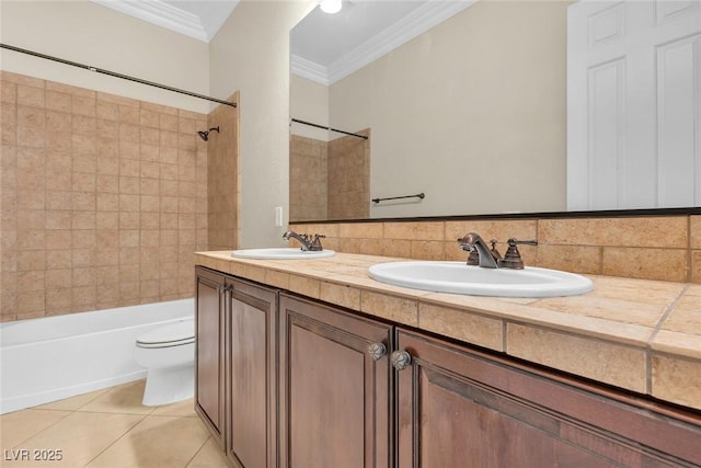 7505 Java Sparrow St, North Las Vegas, NV 89084 - bathroom featuring ornamental molding, toilet, double vanity, shower / washtub combination, and tile patterned flooring