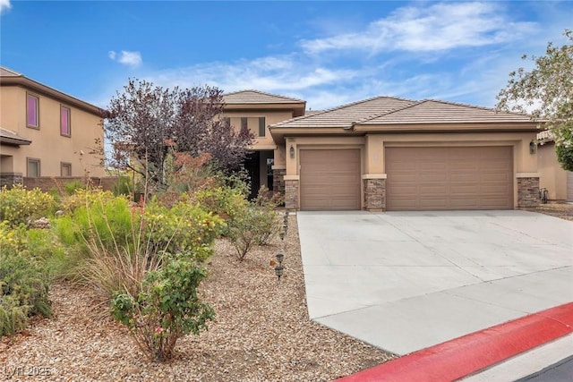 7505 Java Sparrow St, North Las Vegas, NV 89084 - view of front of house with a garage, driveway, stone siding, and stucco siding