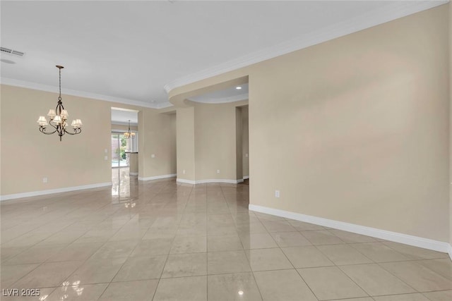 7505 Java Sparrow St, North Las Vegas, NV 89084 - spare room with a chandelier, ornamental molding, light tile patterned floors, and baseboards