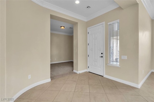 7505 Java Sparrow St, North Las Vegas, NV 89084 - foyer entrance with baseboards, light tile patterned floors, crown molding, and light carpet