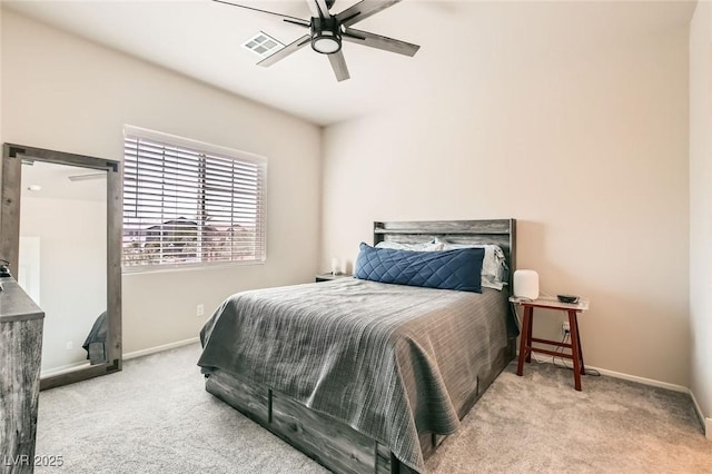 carpeted bedroom with baseboards and a ceiling fan