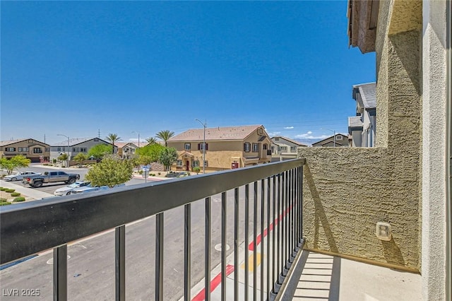balcony featuring a residential view