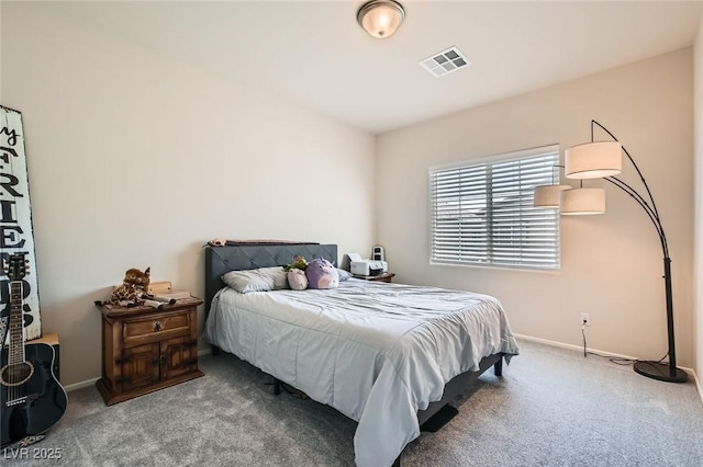 carpeted bedroom with baseboards