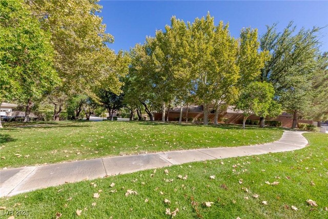 437 Pinnacle Heights Ln, Las Vegas, NV 89144 - surrounding community with a lawn