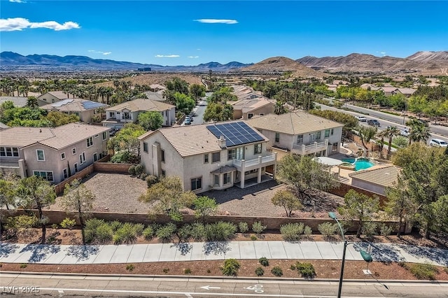 aerial perspective of suburban area with mountains