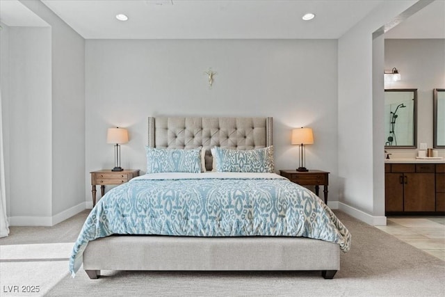 38 Costa Tropical Dr, Henderson, NV 89011 - bedroom featuring light carpet, baseboards, ensuite bath, and recessed lighting
