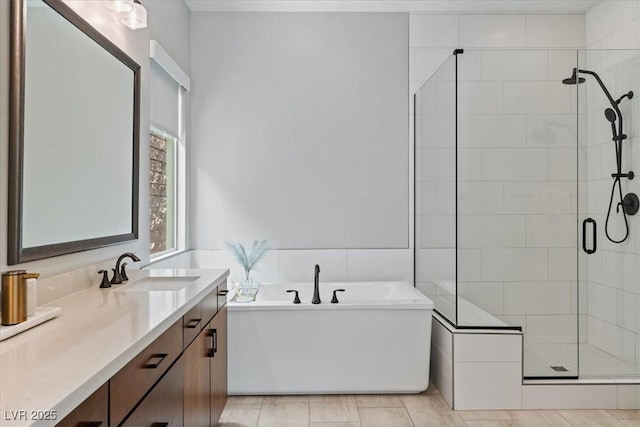 38 Costa Tropical Dr, Henderson, NV 89011 - full bathroom with a shower stall, a freestanding bath, and vanity