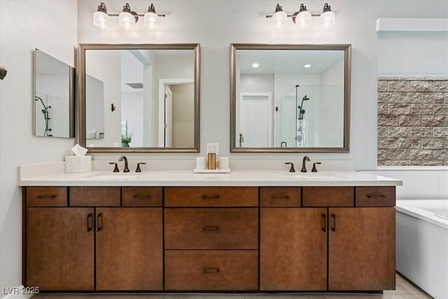 38 Costa Tropical Dr, Henderson, NV 89011 - bathroom featuring a shower stall, double vanity, and a bath