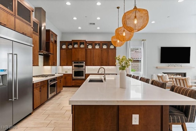 38 Costa Tropical Dr, Henderson, NV 89011 - kitchen featuring stainless steel appliances, a sink, recessed lighting, a breakfast bar area, and a large island