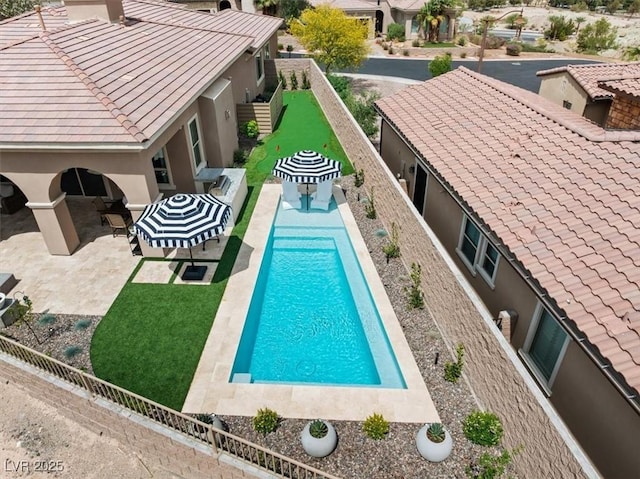 38 Costa Tropical Dr, Henderson, NV 89011 - view of swimming pool with a patio area and a fenced backyard