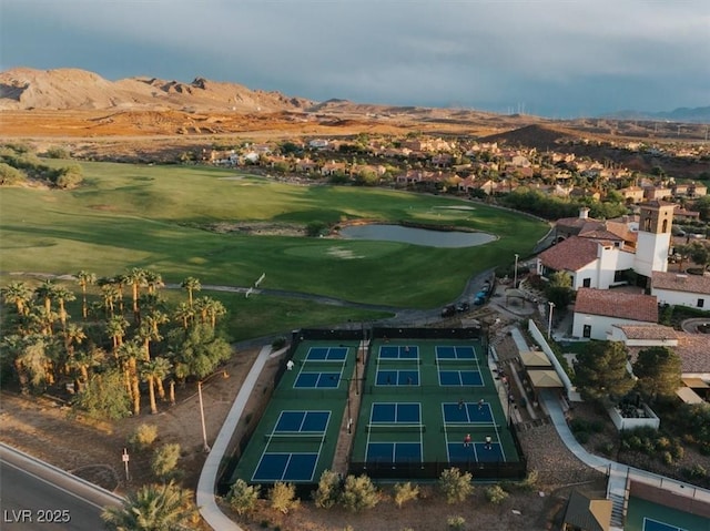 38 Costa Tropical Dr, Henderson, NV 89011 - aerial view of property's location featuring a mountainous background, a golf club, and nearby suburban area