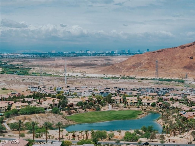 38 Costa Tropical Dr, Henderson, NV 89011 - aerial perspective of suburban area with a water and mountain view