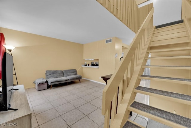 4770 Topaz St Unit 108, Las Vegas, NV 89121 - staircase featuring tile patterned flooring and baseboards