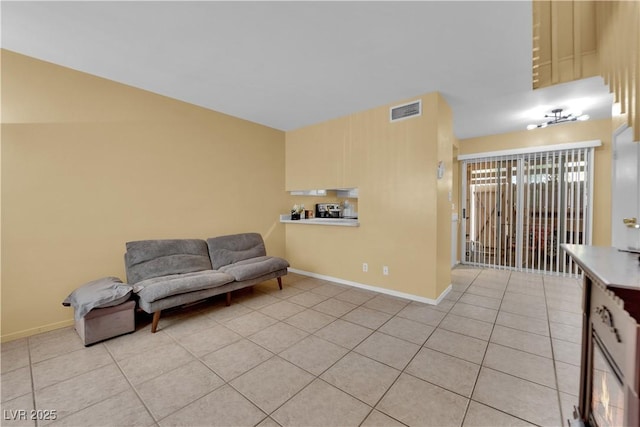 4770 Topaz St Unit 108, Las Vegas, NV 89121 - sitting room featuring light tile patterned flooring and baseboards