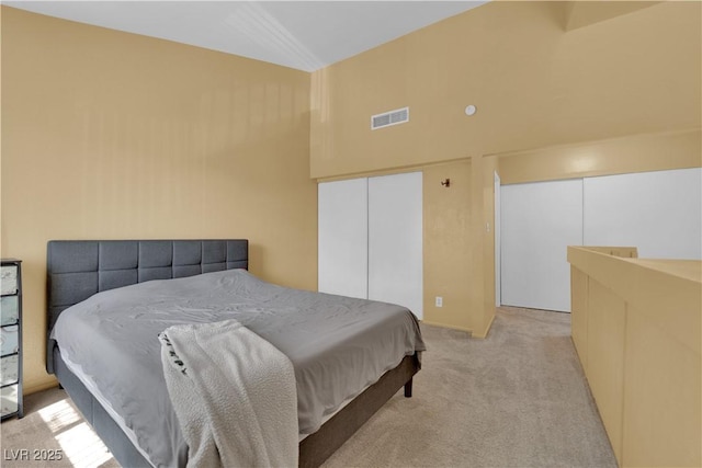 4770 Topaz St Unit 108, Las Vegas, NV 89121 - bedroom featuring light colored carpet and a high ceiling
