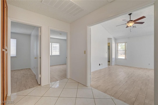 6432 Jean Lee Dr, Las Vegas, NV 89108 - unfurnished room featuring ceiling fan, light wood-type flooring, and a textured ceiling