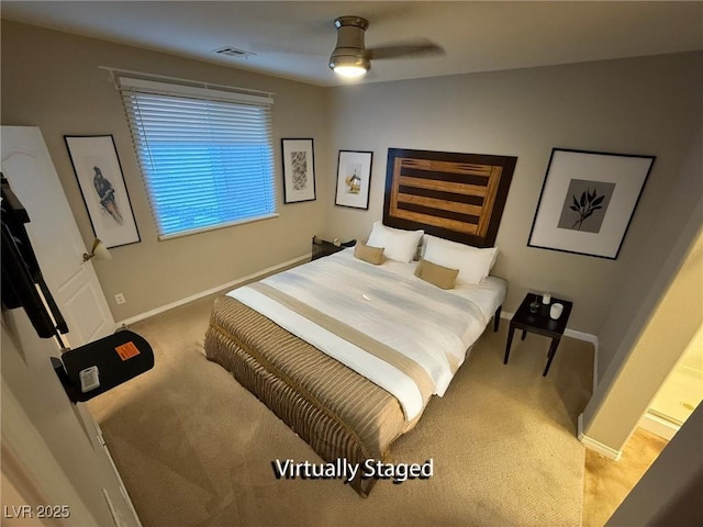 5019 Quiet Falls Ct, Las Vegas, NV 89141 - carpeted bedroom with baseboards and ceiling fan