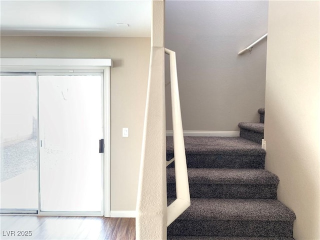 stairway with baseboards