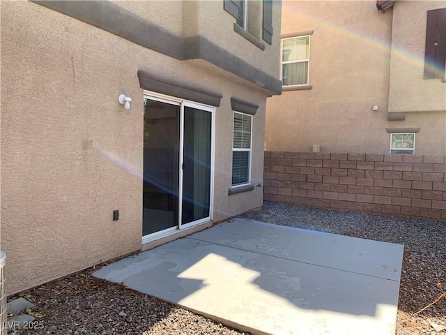 view of patio with fence