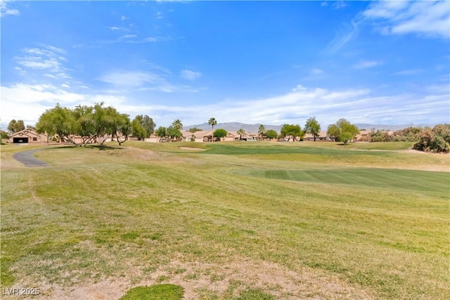 1223 Golf Club Dr, Laughlin, NV 89029 - view of property's community featuring golf course view, a lawn, and a mountain view