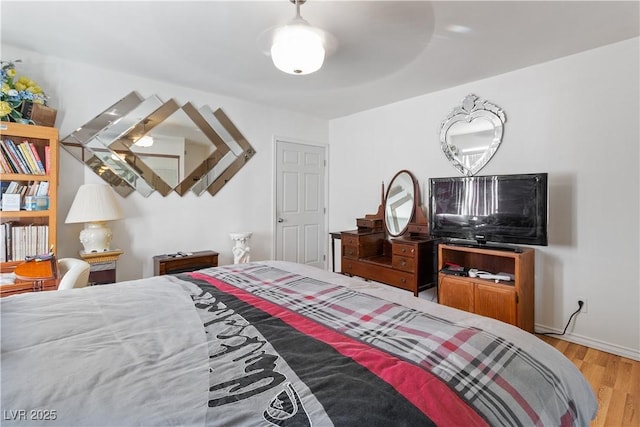 1223 Golf Club Dr, Laughlin, NV 89029 - bedroom featuring wood finished floors and baseboards