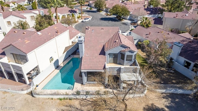 aerial view of residential area with a pool area
