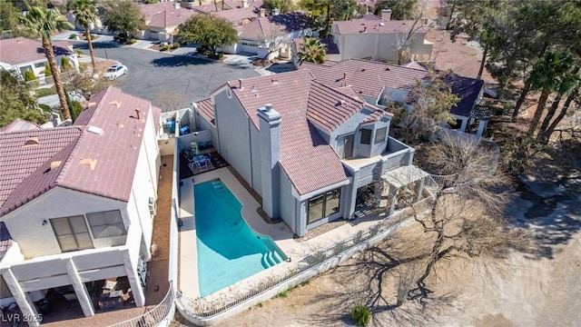 aerial view of residential area with a pool area