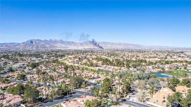 aerial view of residential area with a water and mountain view