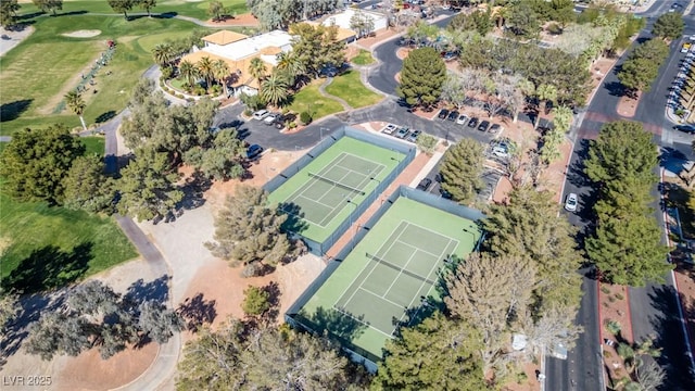 aerial overview of property's location featuring a golf course