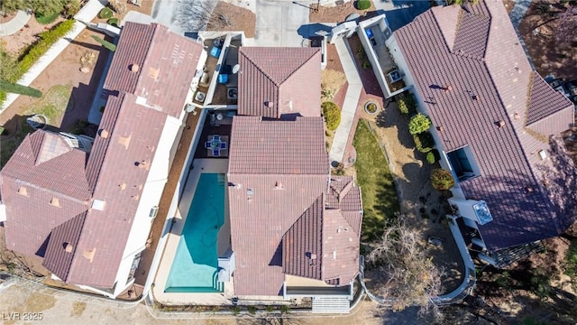 view of subject property featuring a pool area