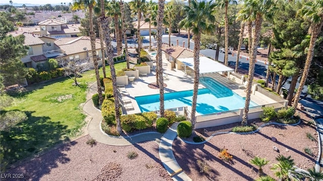 aerial perspective of suburban area with a pool
