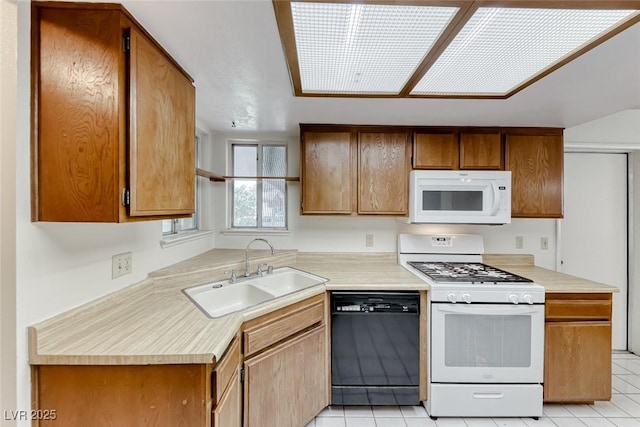 729 Scottsdale St, Henderson, NV 89002 - kitchen with white appliances, a sink, light countertops, and light tile patterned floors