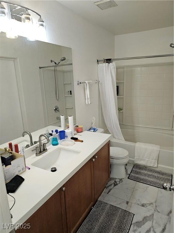 7461 Enviable Ct, Las Vegas, NV 89149 - full bath with shower / tub combo, marble look tile flooring, toilet, and vanity