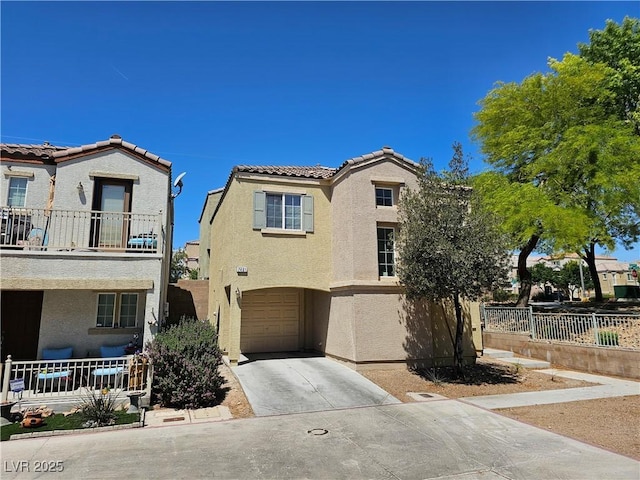 7461 Enviable Ct, Las Vegas, NV 89149 - view of front of property with stucco siding, a garage, concrete driveway, and a tile roof