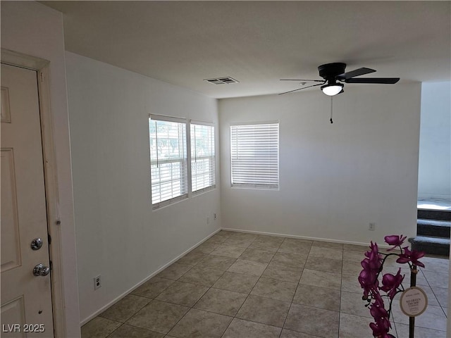 7461 Enviable Ct, Las Vegas, NV 89149 - unfurnished room featuring ceiling fan, tile patterned flooring, and baseboards
