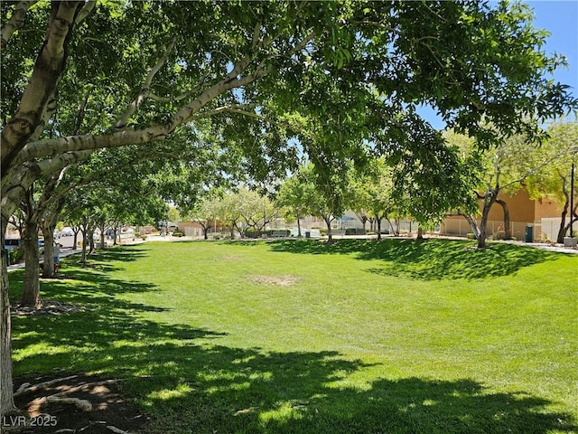 7461 Enviable Ct, Las Vegas, NV 89149 - surrounding community featuring a yard