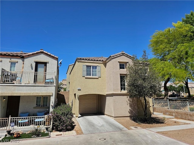 7461 Enviable Ct, Las Vegas, NV 89149 - view of front of house with stucco siding, a garage, concrete driveway, a tile roof, and a balcony