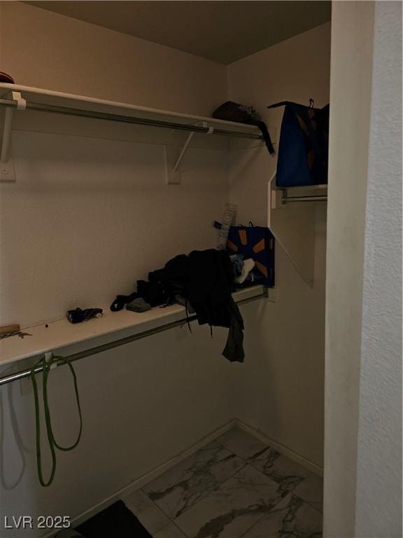 7461 Enviable Ct, Las Vegas, NV 89149 - walk in closet with marble finish flooring
