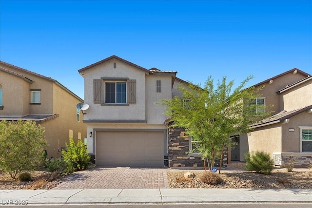 6854 Chargehand Ave, Las Vegas, NV 89156 - traditional-style house with a garage, stucco siding, decorative driveway, and stone siding