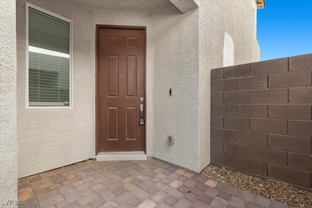 6854 Chargehand Ave, Las Vegas, NV 89156 - property entrance featuring stucco siding