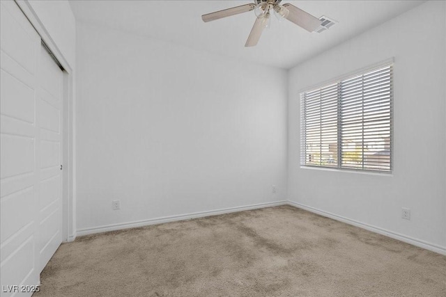 6854 Chargehand Ave, Las Vegas, NV 89156 - unfurnished room with carpet flooring, ceiling fan, and baseboards