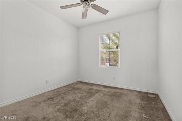 6854 Chargehand Ave, Las Vegas, NV 89156 - spare room featuring carpet flooring, baseboards, and a ceiling fan
