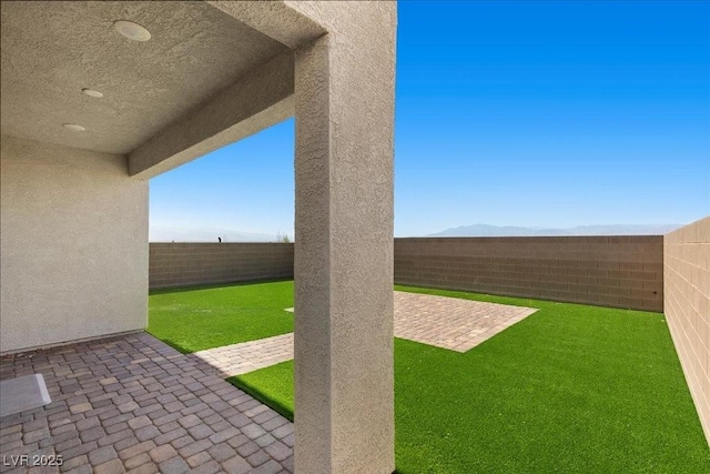 6854 Chargehand Ave, Las Vegas, NV 89156 - fenced backyard featuring a patio