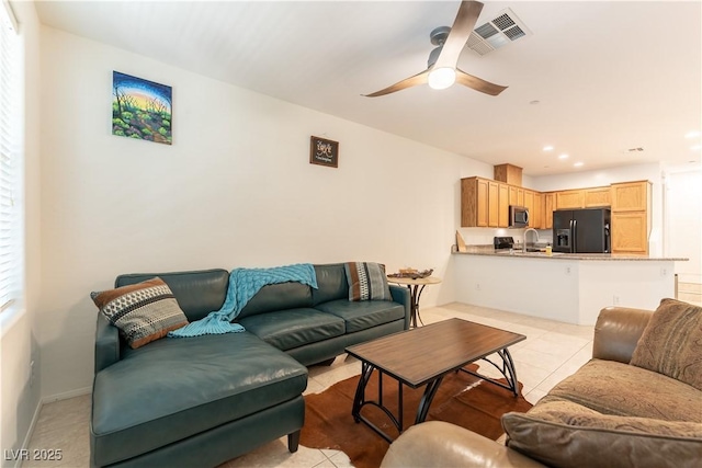 9986 Sand Key St, Las Vegas, NV 89178 - living room with a ceiling fan, light tile patterned floors, and recessed lighting