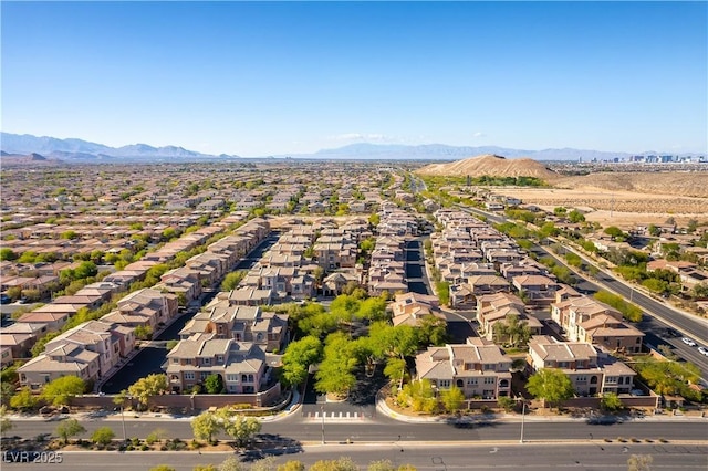 9986 Sand Key St, Las Vegas, NV 89178 - aerial perspective of suburban area featuring a mountainous background