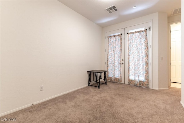 9986 Sand Key St, Las Vegas, NV 89178 - empty room featuring carpet, french doors, and baseboards