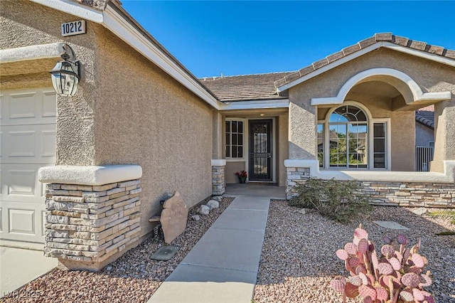 10212 Donald Weese Ct, Las Vegas, NV 89129 - doorway to property featuring stucco siding and an attached garage