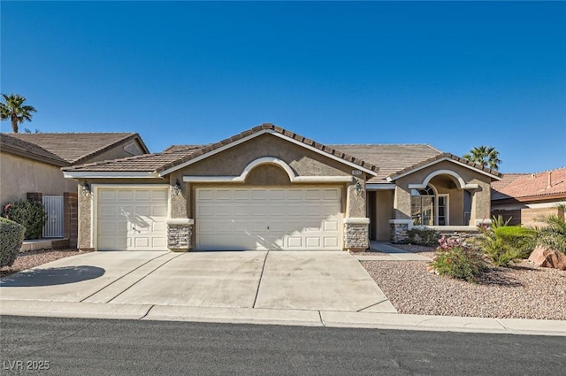 10212 Donald Weese Ct, Las Vegas, NV 89129 - ranch-style house with an attached garage, stone siding, driveway, and a tile roof