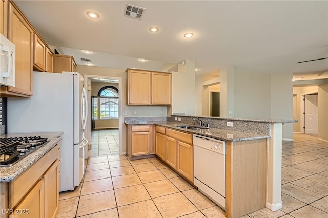10212 Donald Weese Ct, Las Vegas, NV 89129 - kitchen featuring dishwasher, a sink, light brown cabinets, stainless steel gas stovetop, and light tile patterned floors