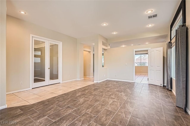 10212 Donald Weese Ct, Las Vegas, NV 89129 - tiled empty room featuring french doors, baseboards, and recessed lighting